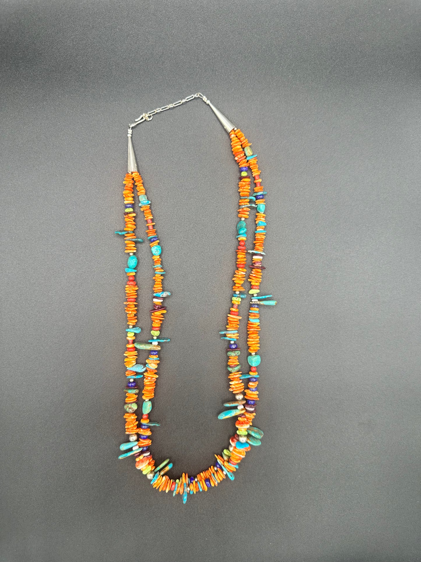 Handcrafted Native American sterling silver and multi-gemstone necklace and pendant.