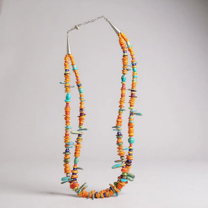 Handcrafted Native American sterling silver and multi-gemstone necklace and pendant.