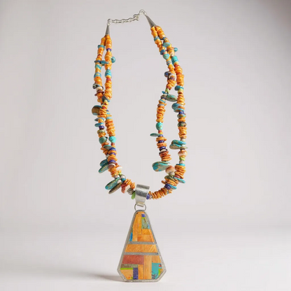 Handcrafted Native American sterling silver and multi-gemstone necklace and pendant.
